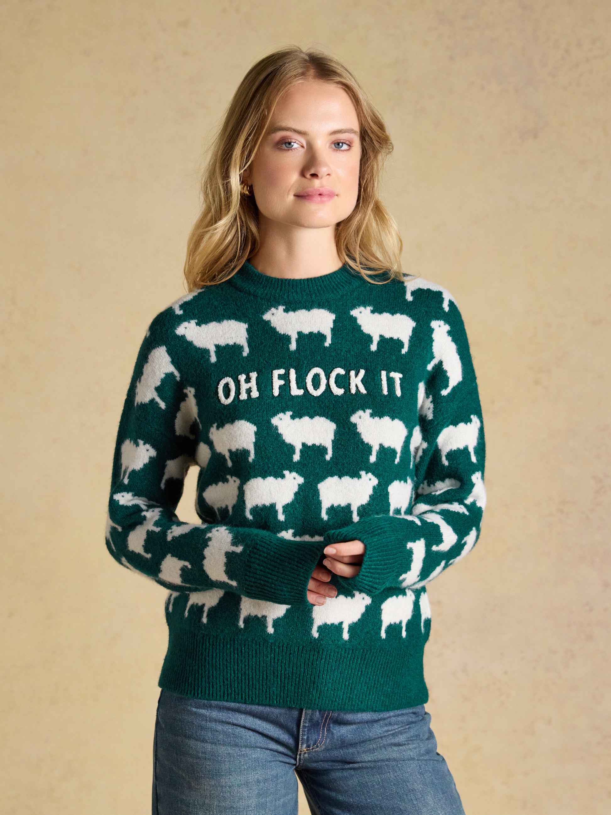Joules Oh Flock It sheep icon crew neck knitted jumper featuring an allover sheep pattern and boucle slogan.
