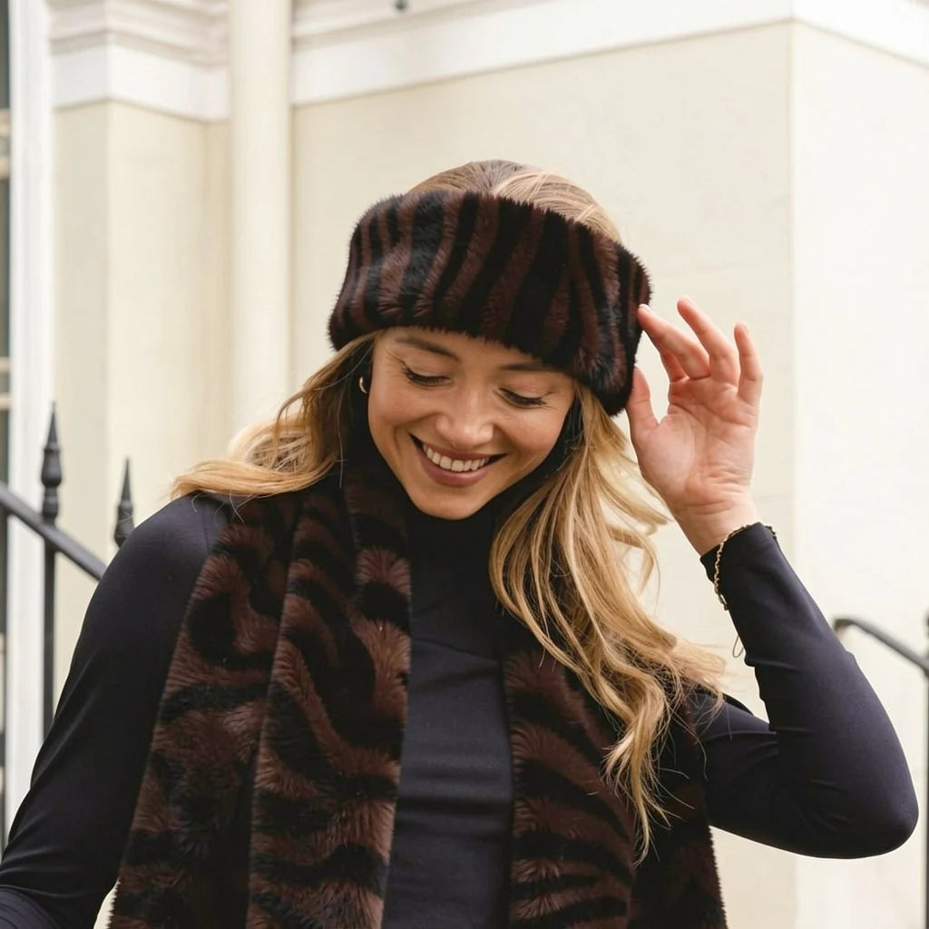 Woman wearing Park Lane dark zebra print faux fur headband