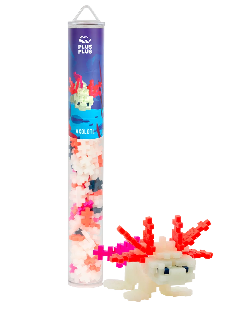 Plus-Plus Axolotl tube packaging alongside a constructed glow-in-the-dark axolotl figure made from interlocking pieces.