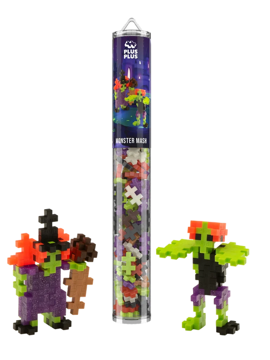 Plus-Plus Monster Mash tube packaged alongside two built monster figures in purple, green, and orange interlocking pieces.