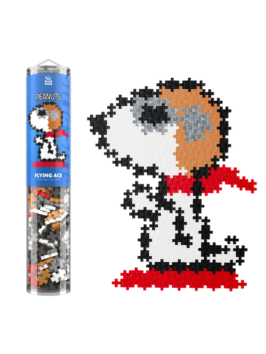 Plus-Plus Snoopy Flying Ace tube container alongside the assembled pixel-style Snoopy artwork featuring his aviator cap and red scarf.