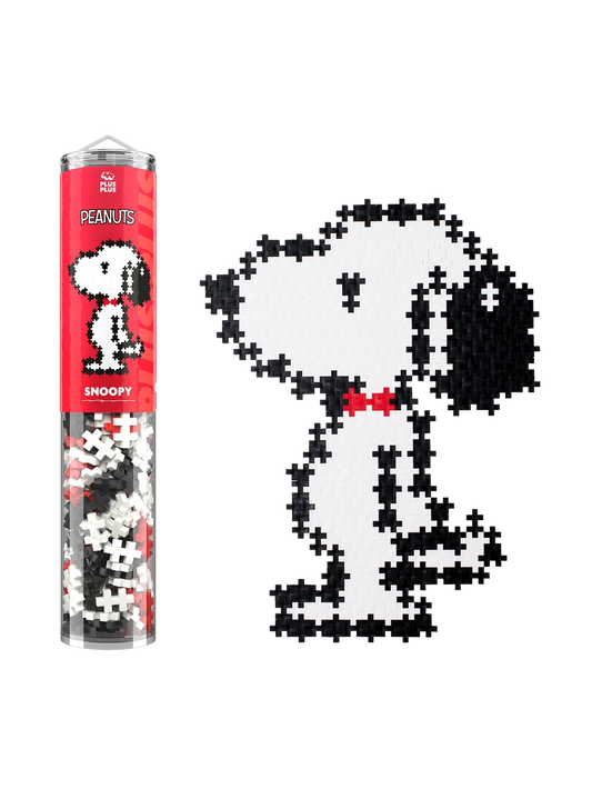 Plus-Plus Snoopy Puzzle by Number tube packaging beside a completed black and white Snoopy figure with a red collar.