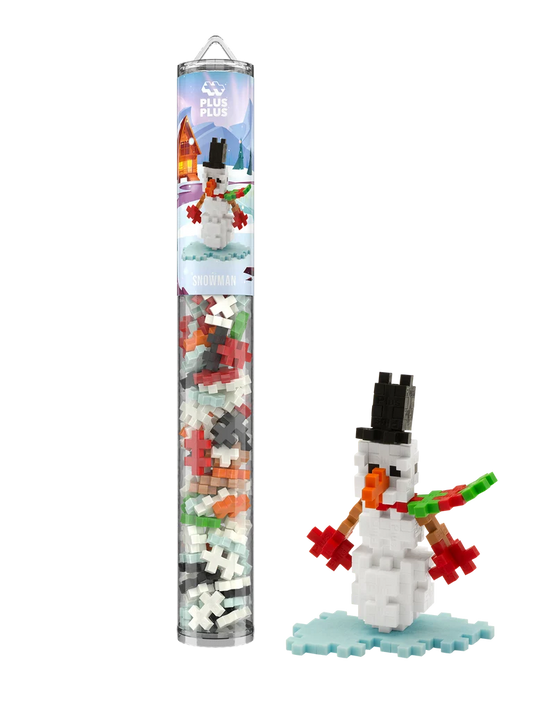 Plus-Plus Snowman storage tube displayed alongside a constructed snowman figure wearing a black hat, scarf, and red mittens.