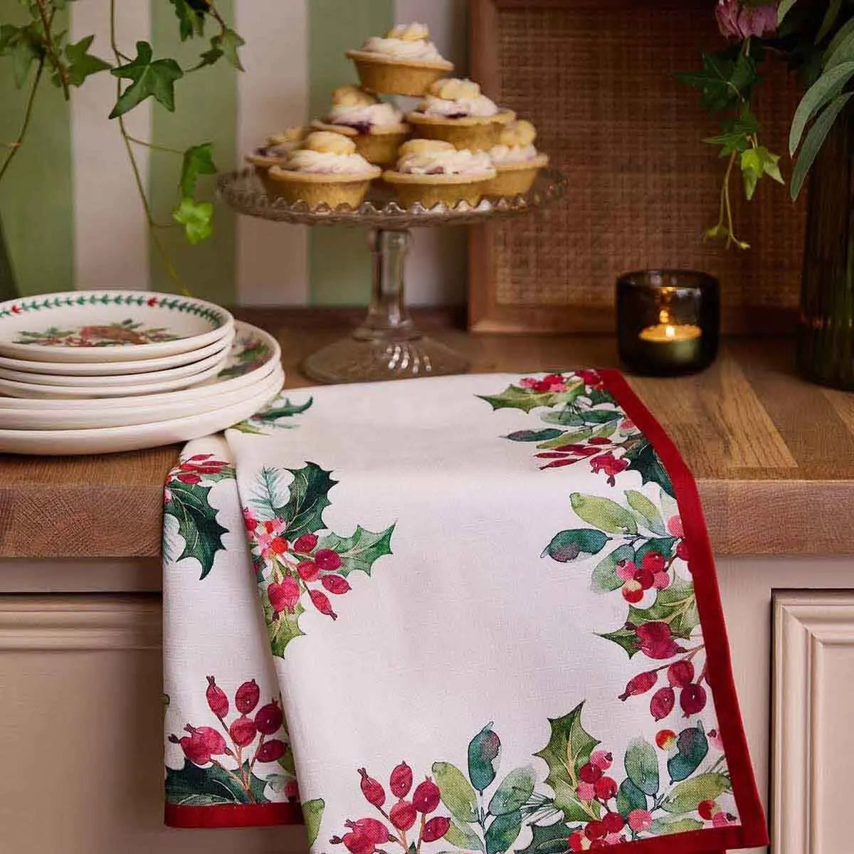 Portmeirion Botanic Garden Christmas Holly 100% cotton tea towel featuring festive holly pattern and red border