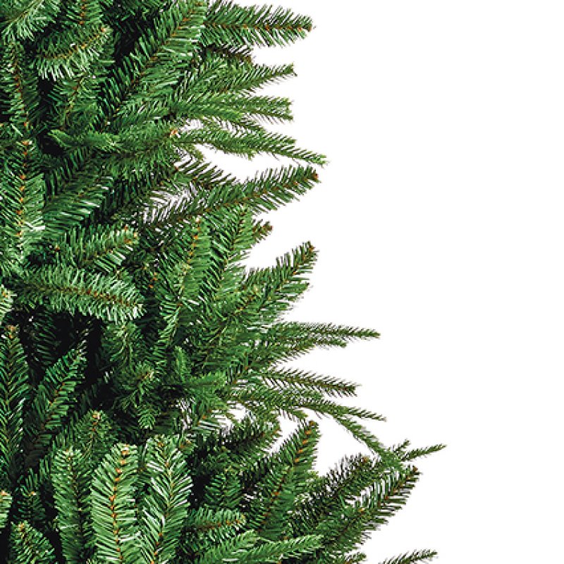 Premier 1.8m Aspen Fir hinged artificial Christmas tree standing on a metal base in a living room setting.