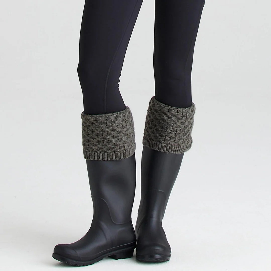 Pair of Ridgeline double cuff welly socks in knitted acrylic worn folded over black wellington boots
