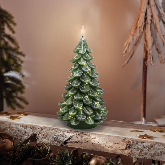 Smart Garden Christmas Tree LED candle with real wax casing glowing on a mantel.