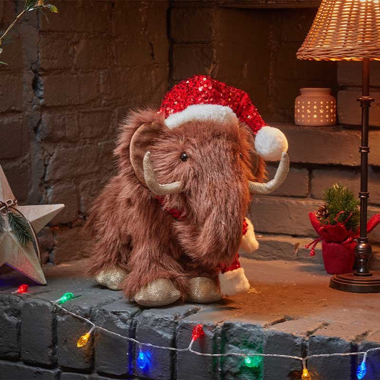 Bring festive fun home with the large Smart Garden Merry Mammoth plush decoration. Features soft fluffy fabric and sequin accents.