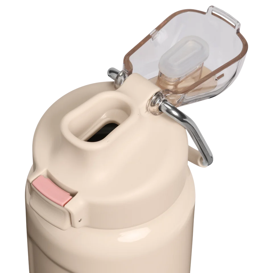 Stanley Classic Wellspring Bottle 0.71L in Champagne featuring stainless steel carry loop and push-button lid