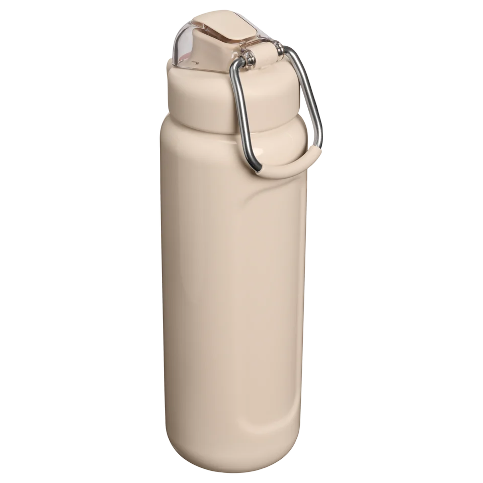 Stanley Classic Wellspring Bottle 0.71L in Champagne featuring stainless steel carry loop and push-button lid