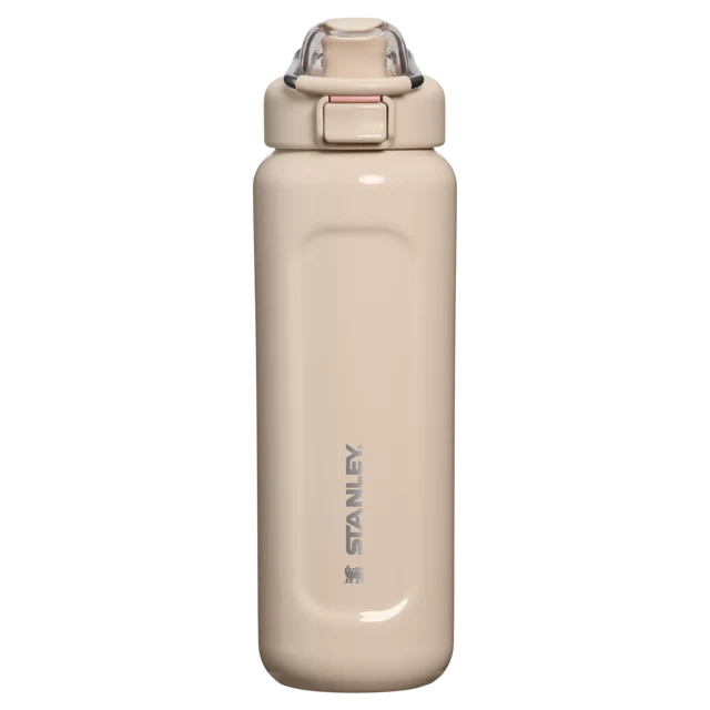 Stanley Classic Wellspring Bottle 0.71L in Champagne featuring stainless steel carry loop and push-button lid