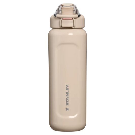 Stanley Classic Wellspring Bottle 0.71L in Champagne featuring stainless steel carry loop and push-button lid