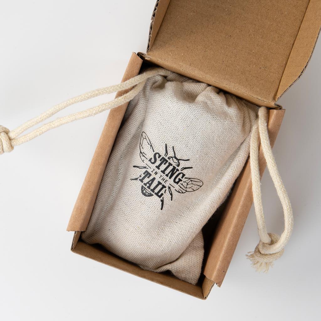 Sting in the Tail Countryman's Boot Brush with wooden handle, stiff bristles, drawstring pouch, and box.