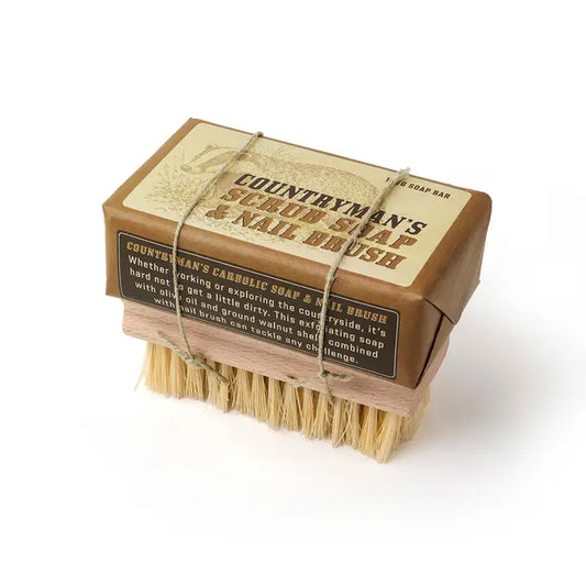 Countryman's carbolic soap bar wrapped with a wooden natural bristle nail brush and string.