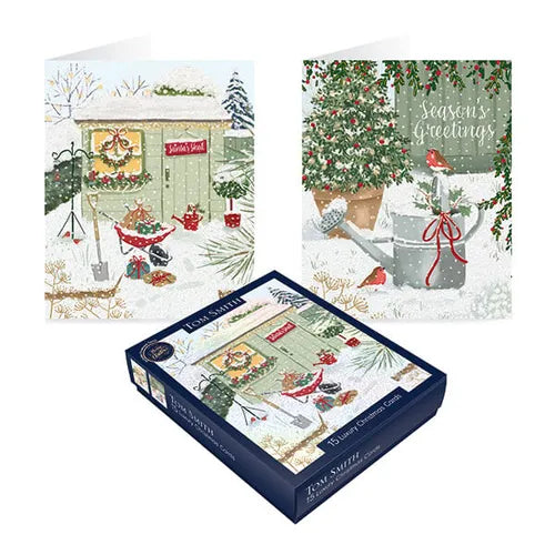 Tom Smith box of 15 luxury Santa's Shed Christmas cards featuring snowy garden shed and robin illustrations.