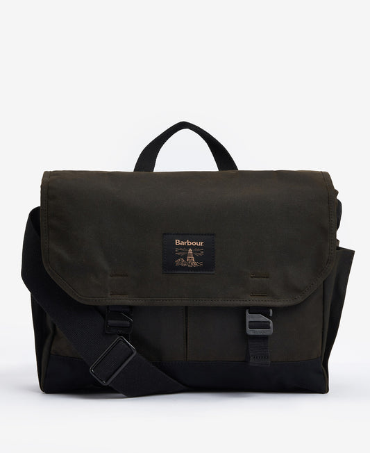 Barbour Field Waxed Messenger Bag in classic waxed cotton, featuring an adjustable webbed shoulder strap and a woven brand label.