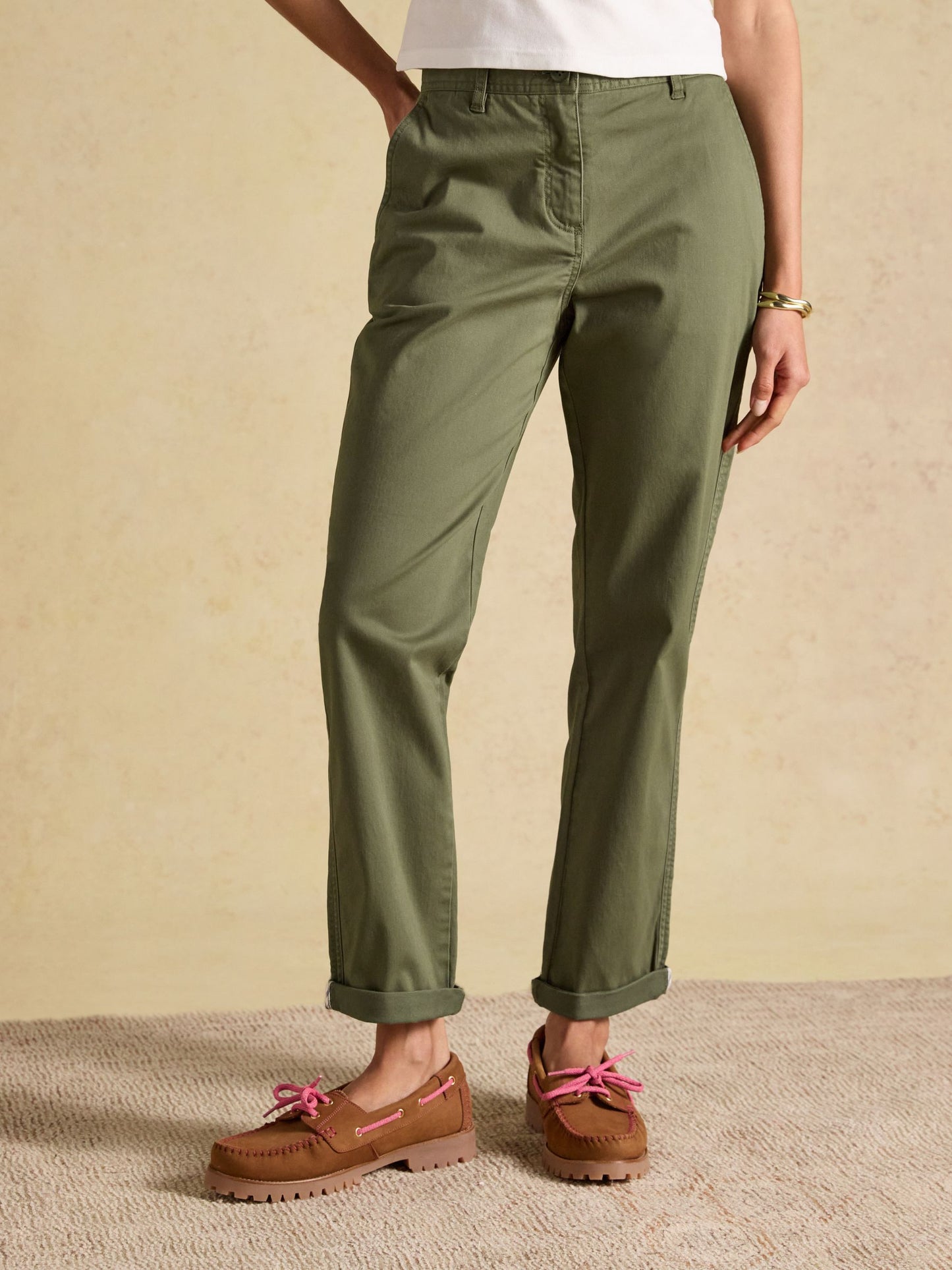 Women's slim-fit stretch cotton chinos in a classic preppy style, featuring a comfortable hidden elasticated waistband.