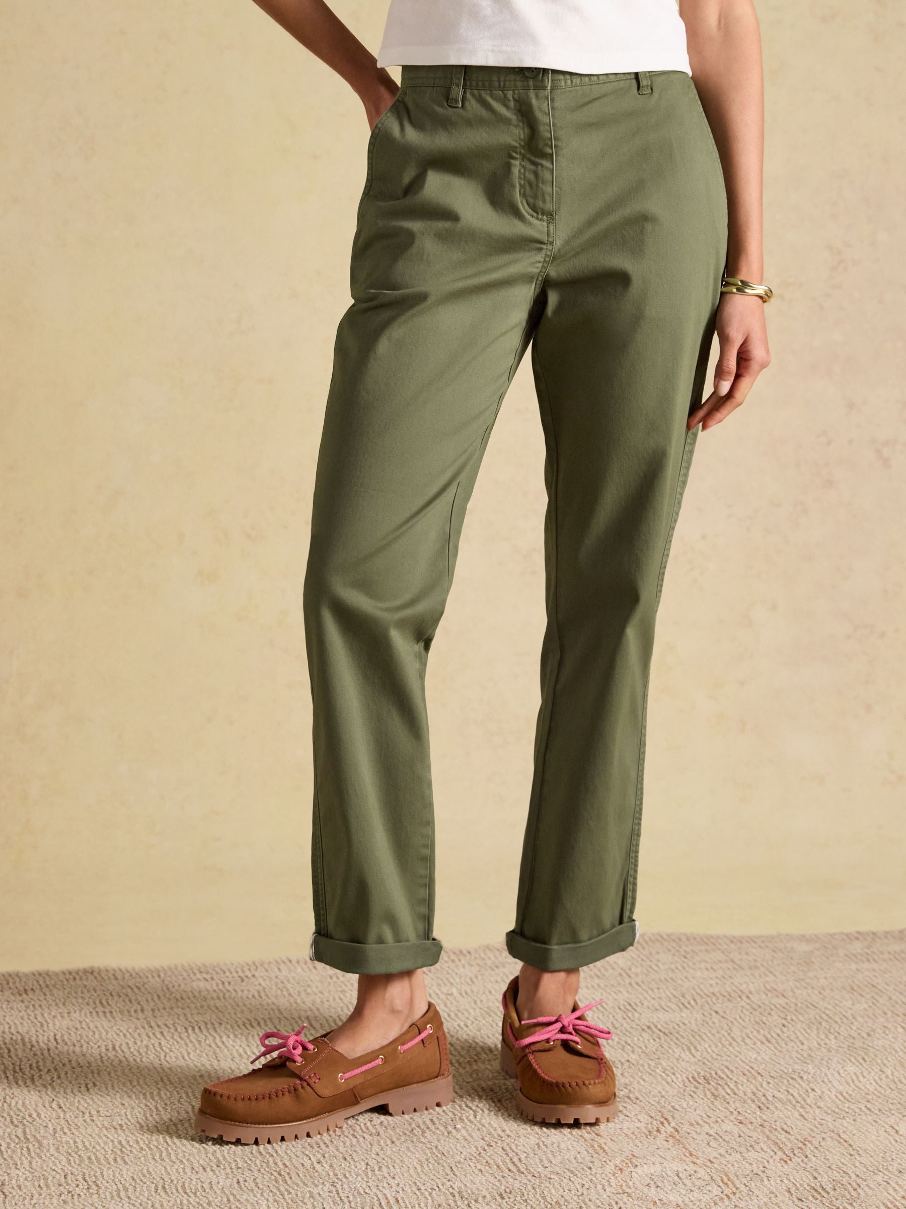 Women's slim-fit stretch cotton chinos in a classic preppy style, featuring a comfortable hidden elasticated waistband.