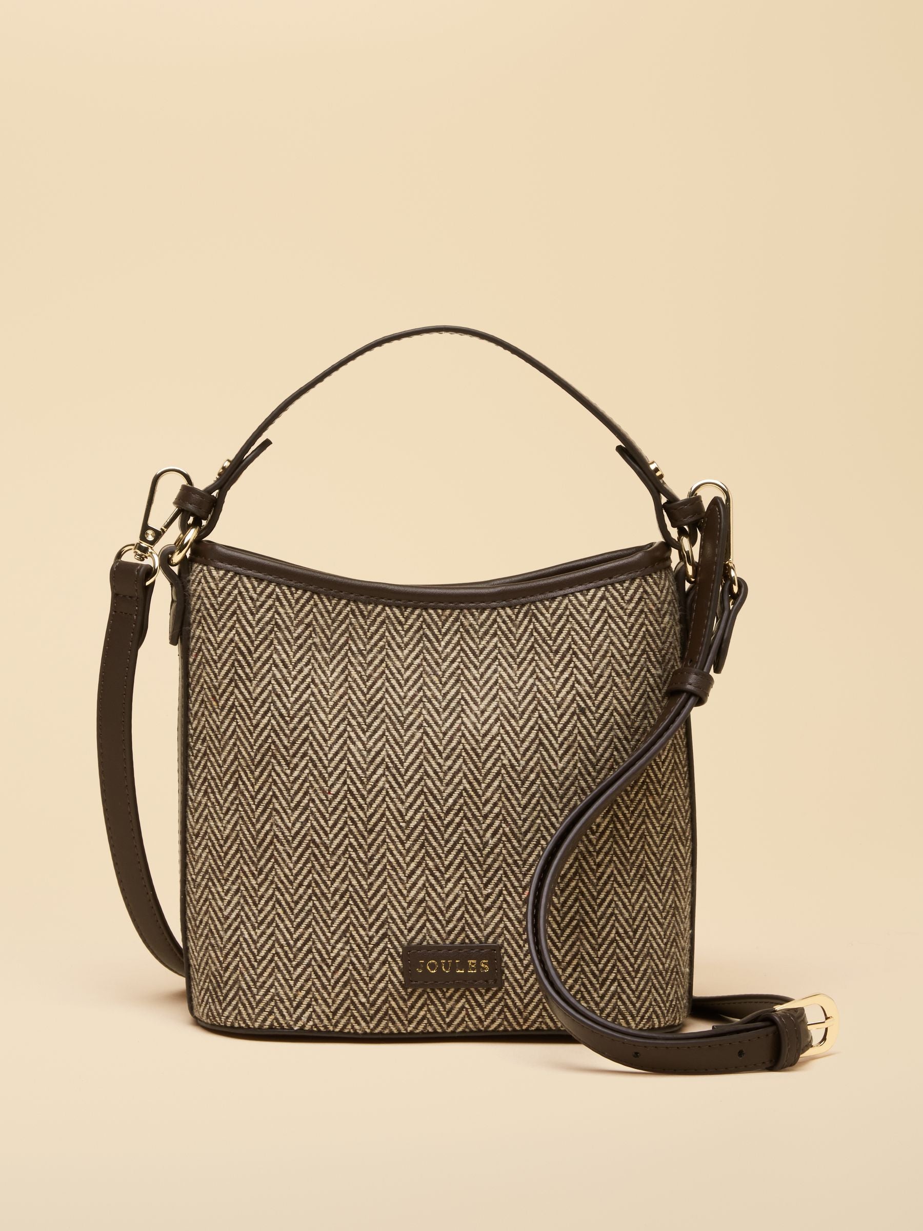 Joules Slouch Bucket Bag in technical weave with smooth faux-leather trim and detachable cross-body strap.