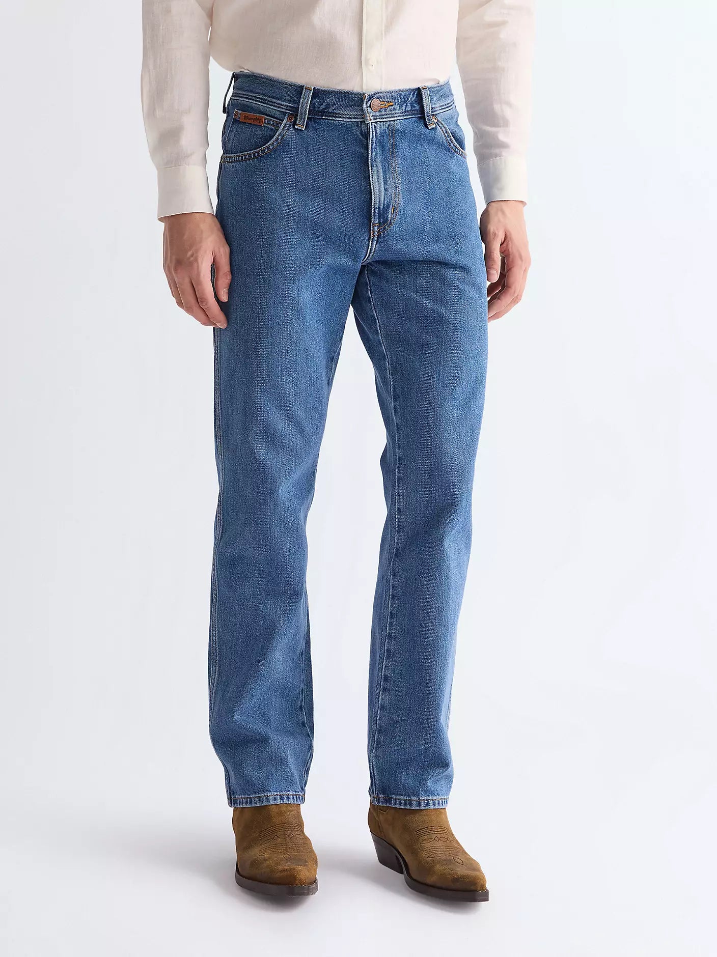 Wrangler Texas Straight Non-Stretch Jeans featuring a classic five pocket design, regular fit, and signature leather logo patch.