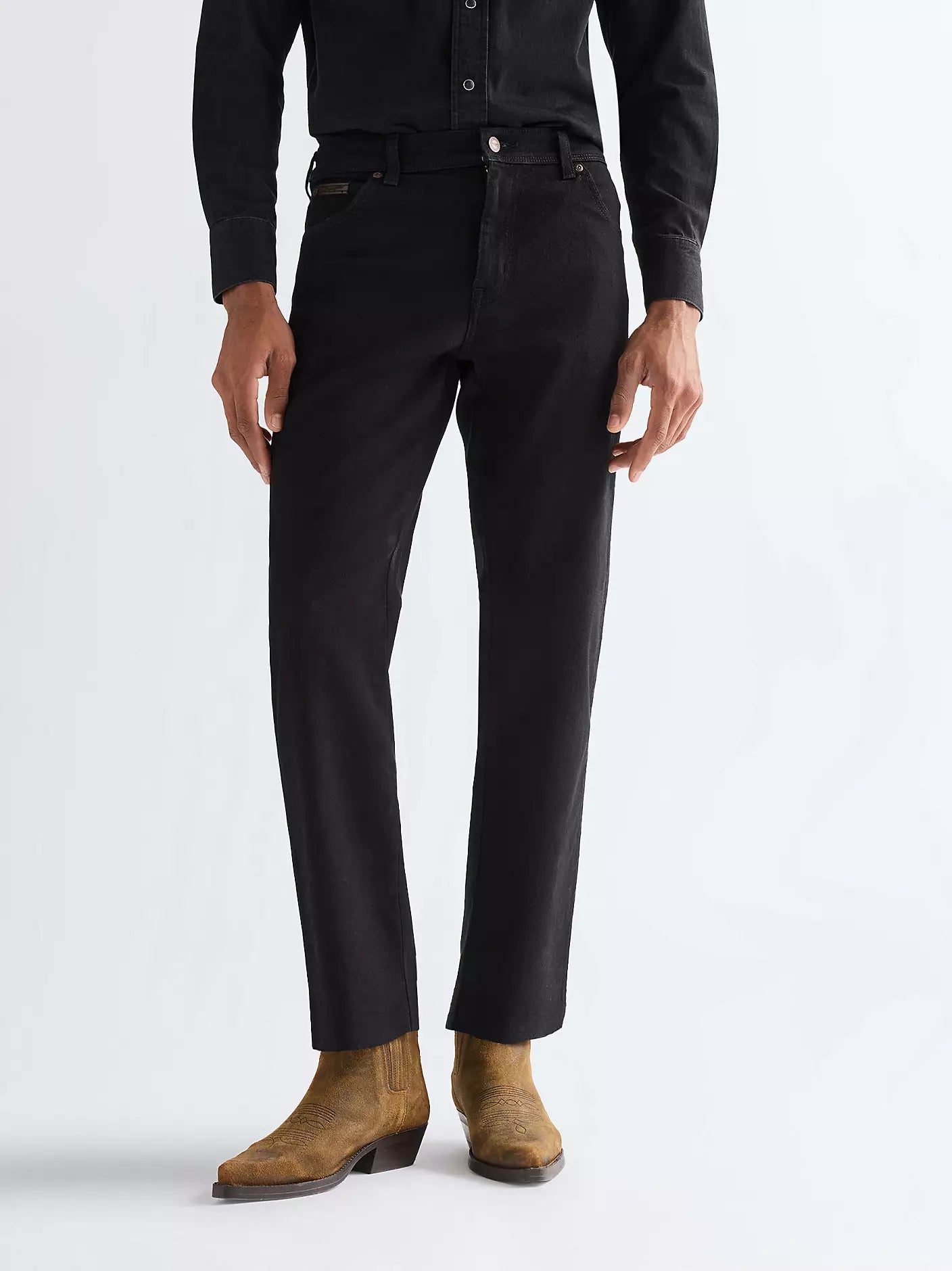 Wrangler Texas Straight Low Stretch Jeans featuring a regular fit, authentic stitching, and a classic leather logo patch.