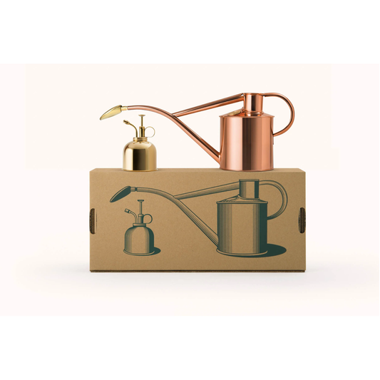 Haws solid copper Rowley Ripple watering can alongside a polished brass Smethwick spritzer