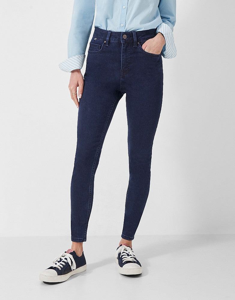 Indigo skinny fit superstretch 5 pocket jean featuring branded metalwork.