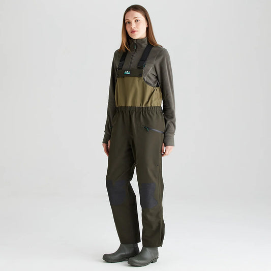 Ridgeline Women's Agri Pro Bib and Brace in action with adjustable braces and reinforced knee patches.
