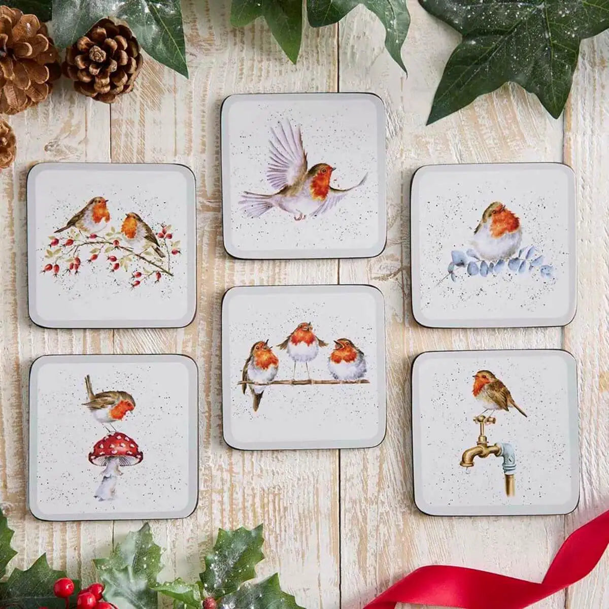 Wrendale Designs Festive Friends set of six cork-backed drinks coasters with watercolour robin illustrations by Hannah Dale