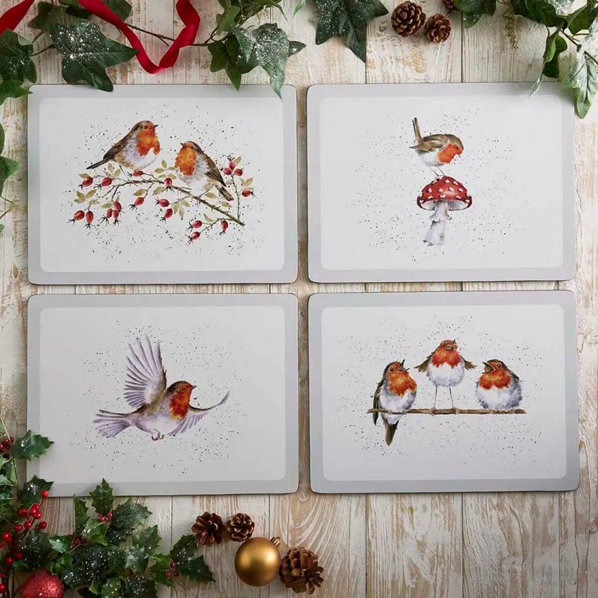 Wrendale Designs Festive Friends set of four large cork backed placemats featuring watercolour robin illustrations by Hannah Dale