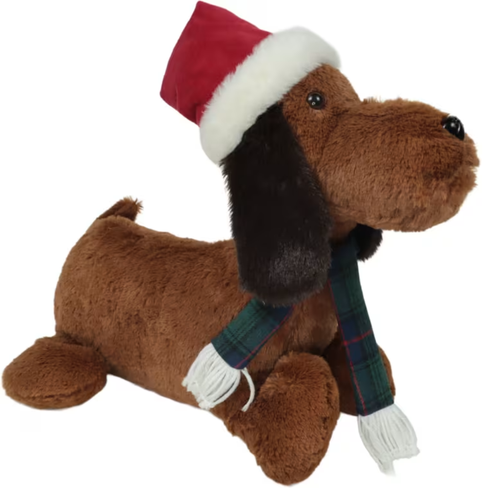 Woodlodge small laying dachshund garden ornament positioned on a outdoor patio step