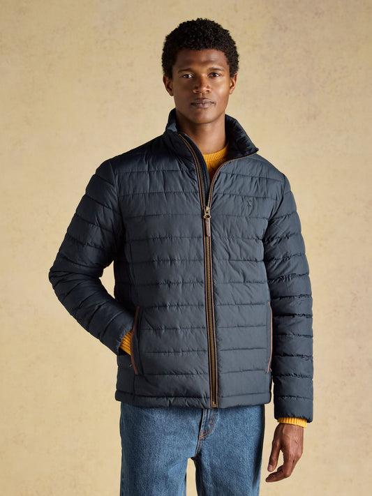 Joules women's padded quilted jacket with funnel neck and suedette trim.