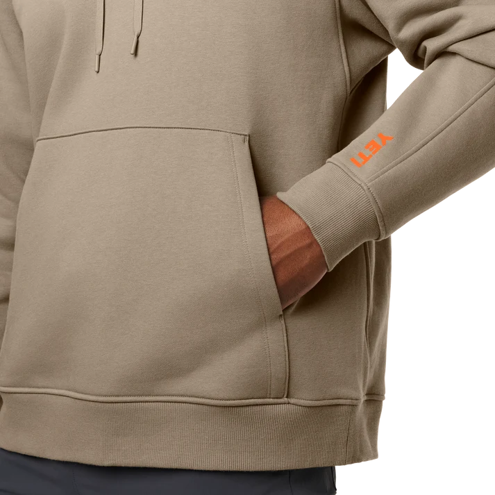 close view of YETI Wild Pullover Fleece Hoodie in Cape Taupe with kangaroo pocket and drawstrings