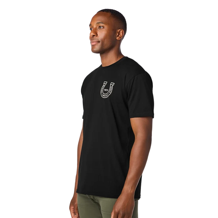 black YETI Horseshoe short sleeve t-shirt showing the white horseshoe graphic emblem on the left chest