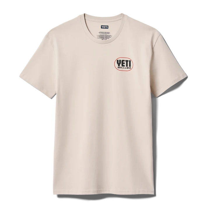 Front and back view of man wearing bone YETI Painted Duck Short Sleeve T-Shirt with flying waterfowl graphic
