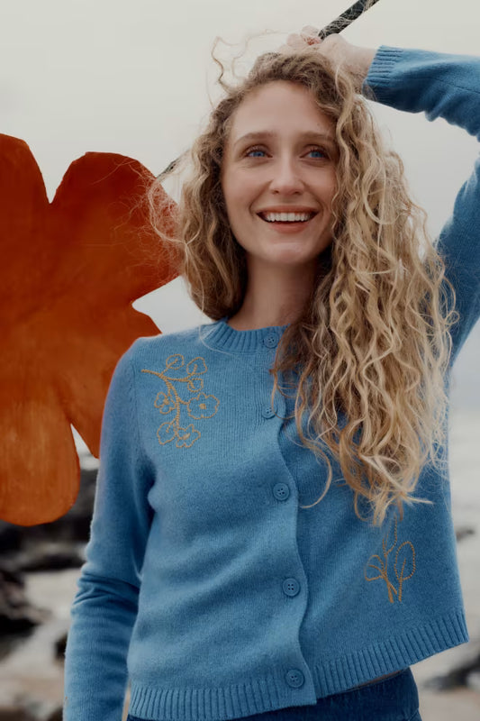 Seasalt Cornwall Potting Shed Knitted Cardigan showing the textured jersey stitch, embroidered details, and button-up front.