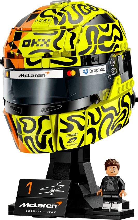LEGO Lando Norris McLaren F1 racing helmet display model with signature papaya and fluorescent yellow livery, including a display stand and minifigure.
