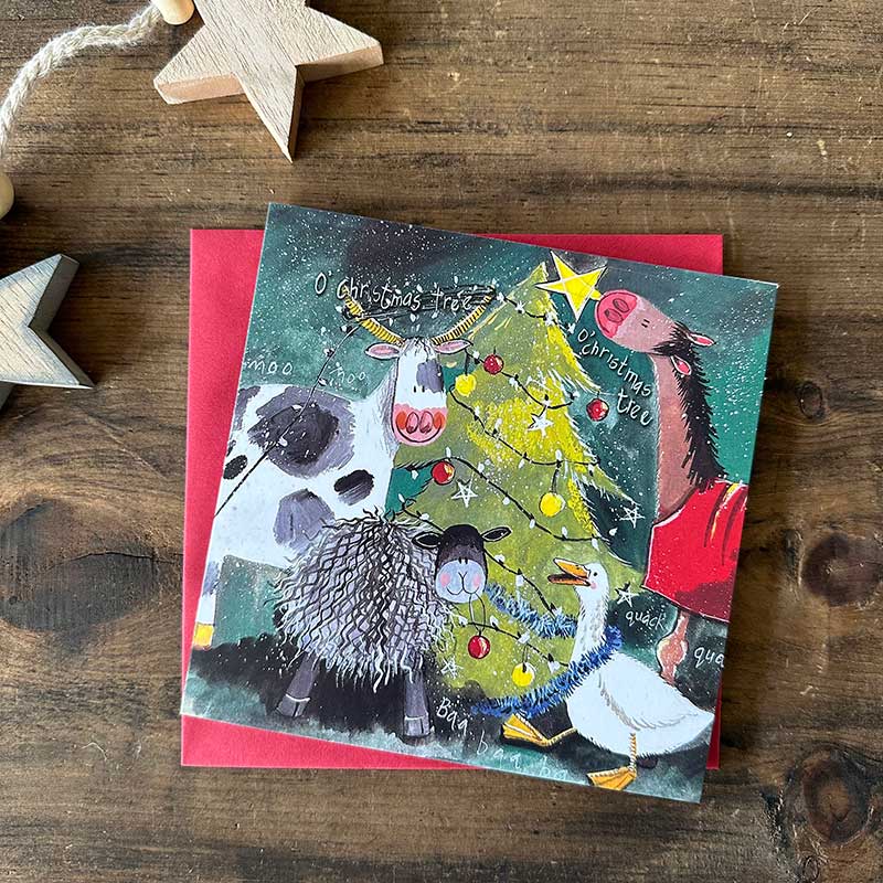 Alex Clark Christmas Tree boxed greeting card set showing illustrated festive tree cards and white envelopes in a box.