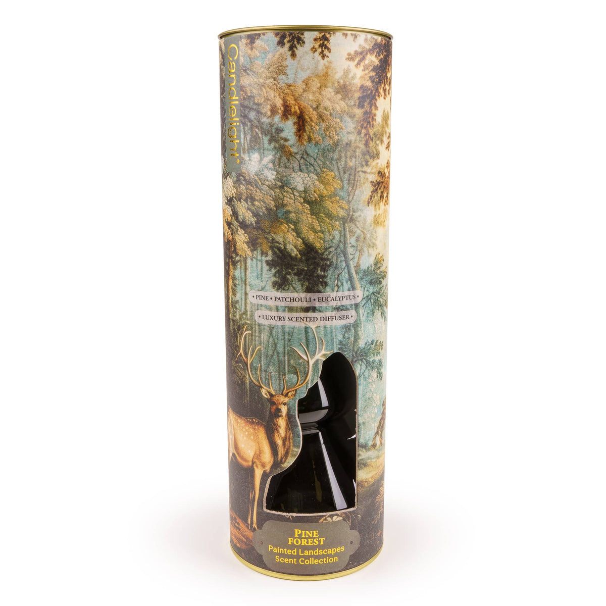 Candlelight Pine Forest 150ml reed diffuser in green glass vessel standing next to stag forest gift tube