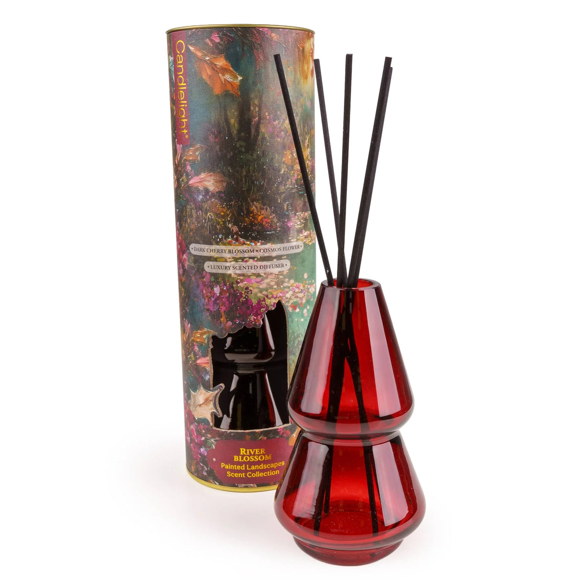 Candlelight River Blossom 150ml reed diffuser in red glass vessel beside illustrated presentation tube