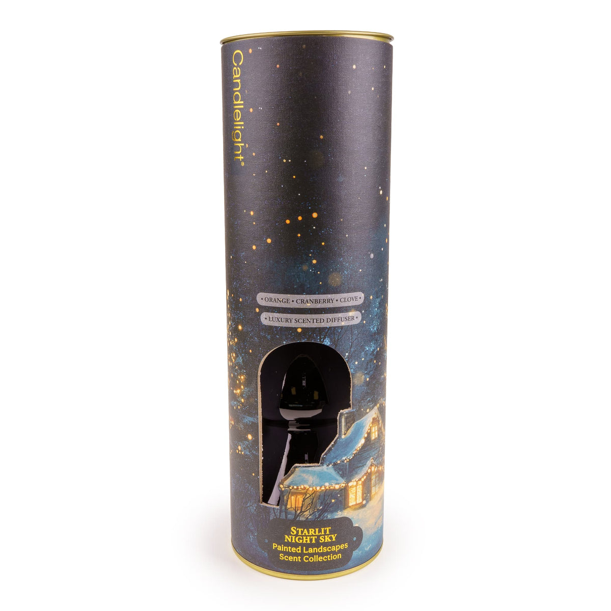 Candlelight Starlit Night Sky 150ml reed diffuser in deep midnight-blue glass bottle beside winter cottage gift tube