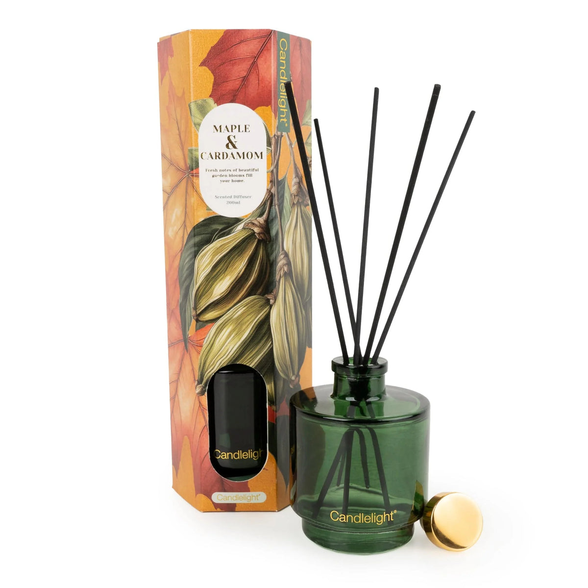 Candlelight Maple and Cardamom 200ml reed diffuser in green glass bottle beside illustrated gift box