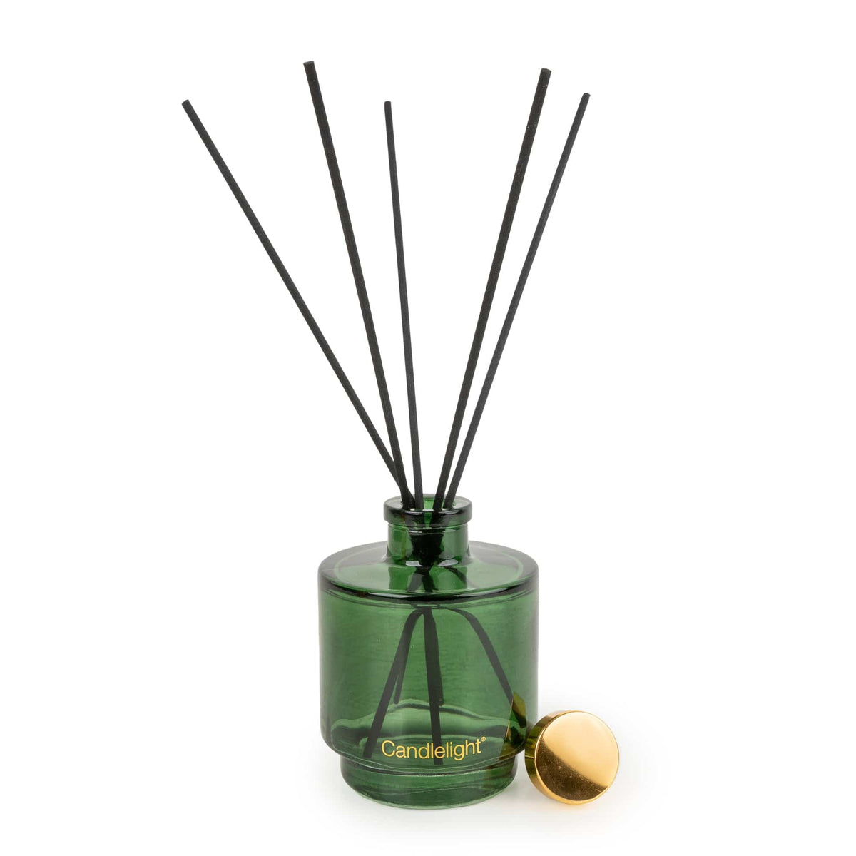 Candlelight Maple and Cardamom 200ml reed diffuser in green glass bottle beside illustrated gift box