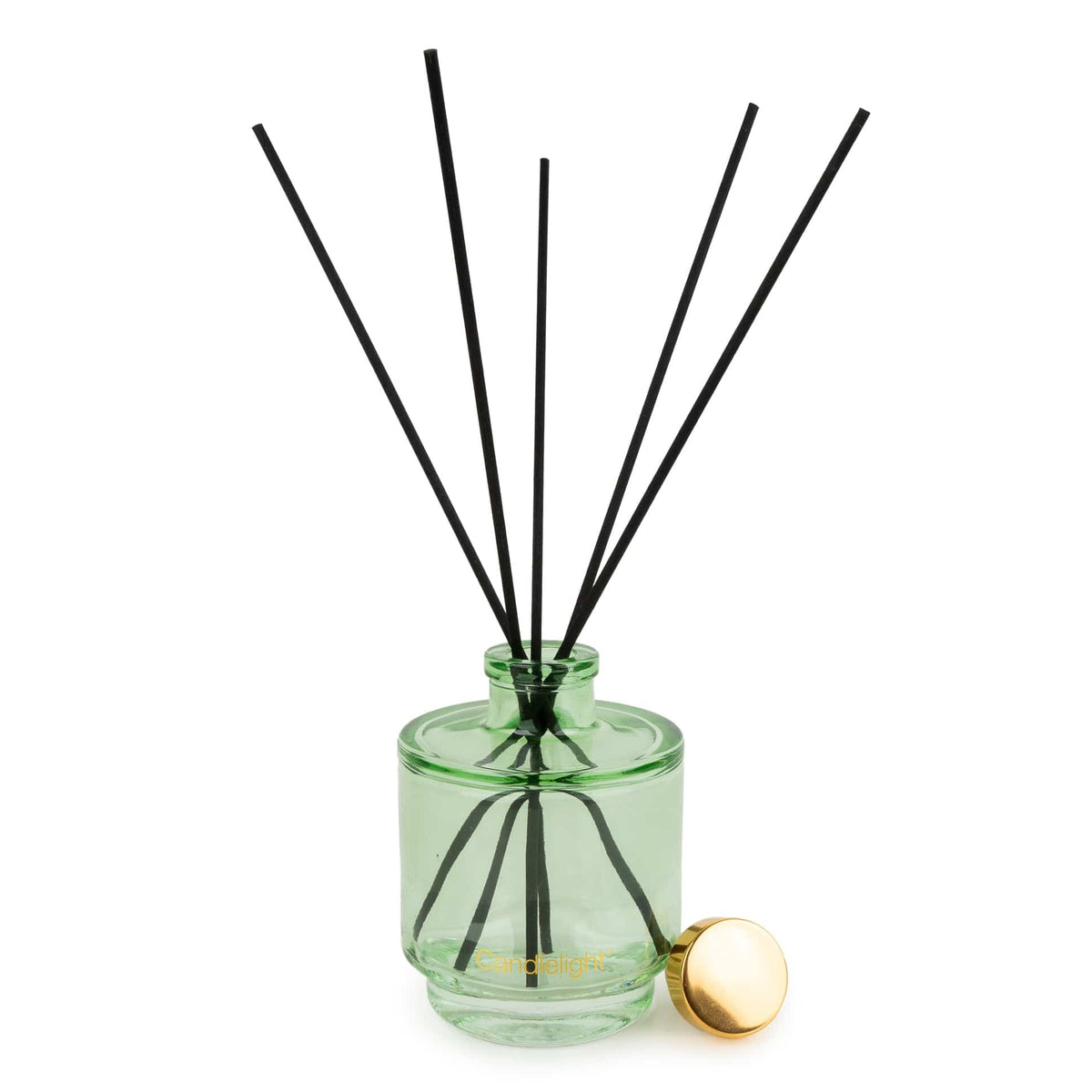 Candlelight Winter Fir and Mistletoe 200ml reed diffuser in green glass bottle beside illustrated gift box