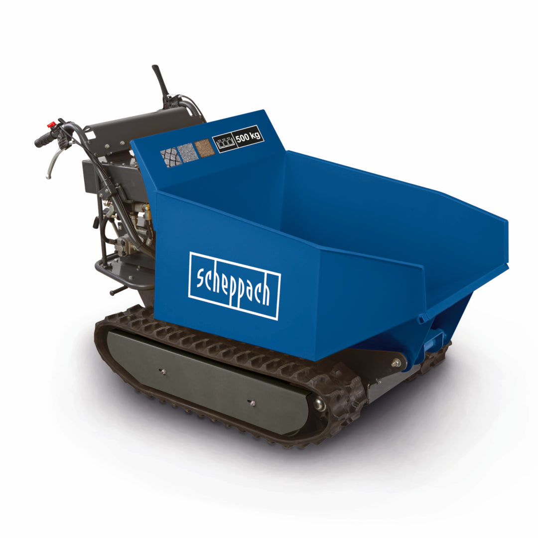 The Scheppach DP5000 Tracked Dumper with 500kg hydraulic tipping container, traversing rugged terrain on a construction site.