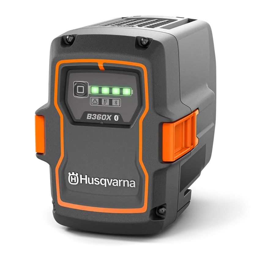Husqvarna 40-B360X 36V 10Ah lithium-ion battery showing its robust black and orange casing, LED charge indicator panel, and side release clips.
