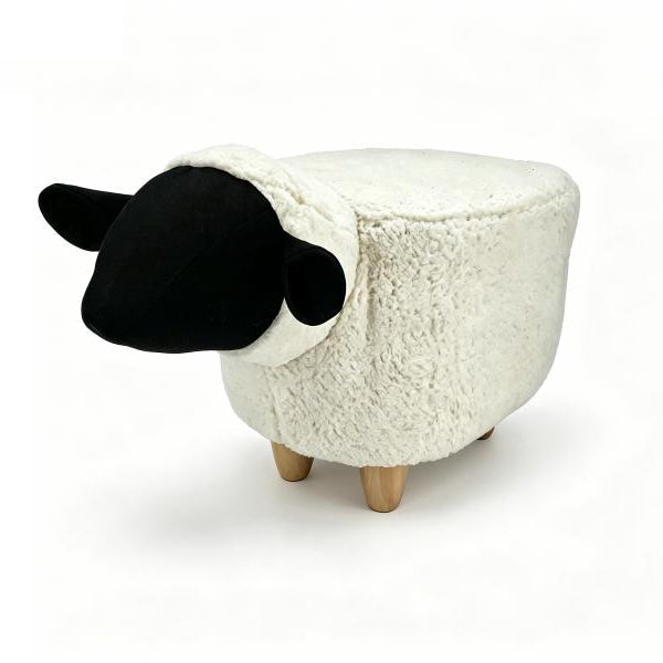 Gardeco Snowflake white sheep synthetic fur footstool with black face and four wooden legs.