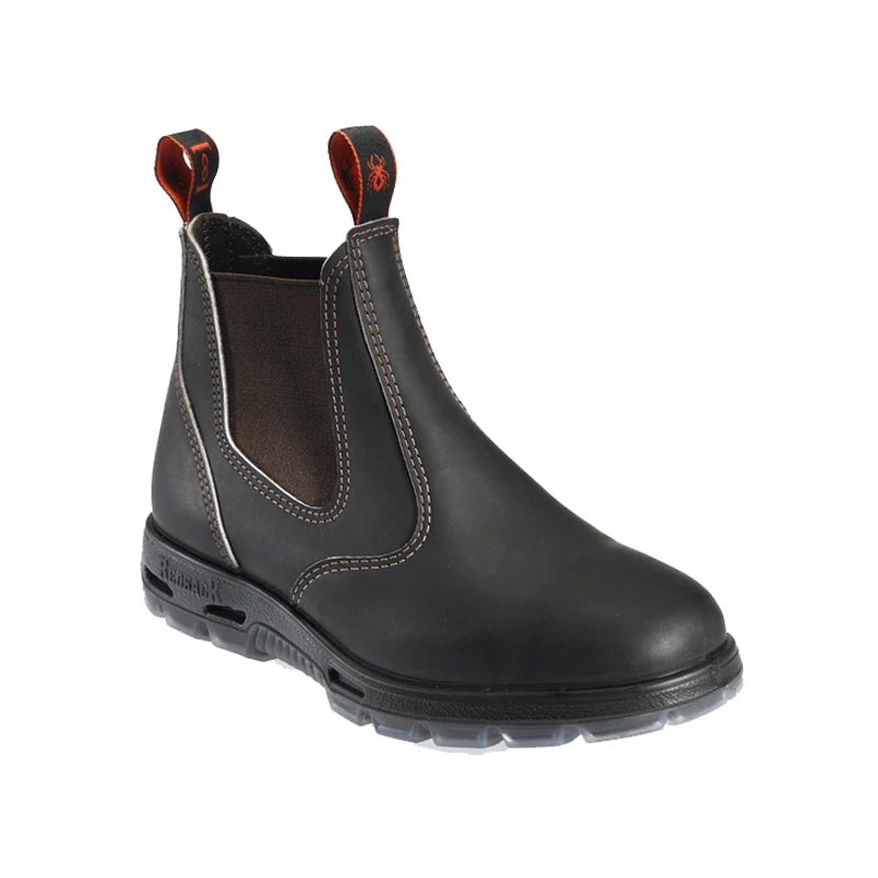 Side view of a Redback Bobcat USBOK unisex steel toe safety boot in dark brown leather with an EN ISO safety certification seal, featuring black elastic sides and red-detailed pull loops.