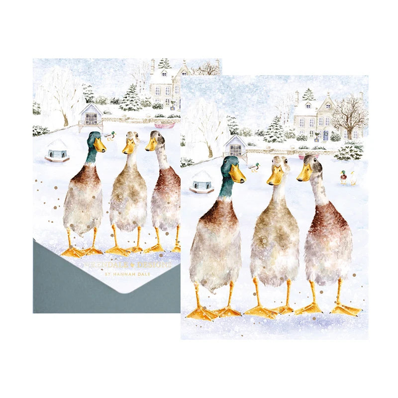 Wrendale Designs Christmas On The Pond notecard pack of 8 showing three runner ducks on a snowy village pond with kraft envelope
