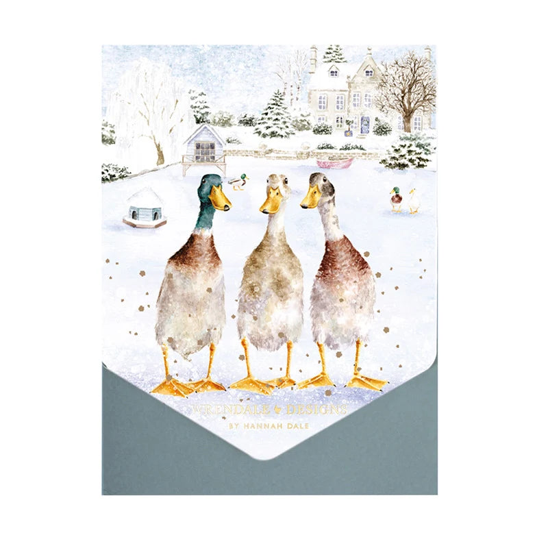 Wrendale Designs Christmas On The Pond notecard pack of 8 showing three runner ducks on a snowy village pond with kraft envelope